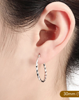 Round Twisted Hoop Earrings in Sterling Silver