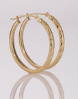 14K Yellow Gold Tornado Diamond-cut Oval Hoop Earrings