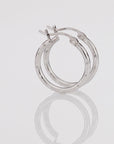 Brilliant Full Diamond-cut Round Tubular Hoop Earrings in Sterling Silver