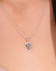 CZ Twin Dolphin Halo Charm Necklace in Sterling Silver