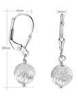 Dangling Ball Earrings with Engravings in Sterling Silver